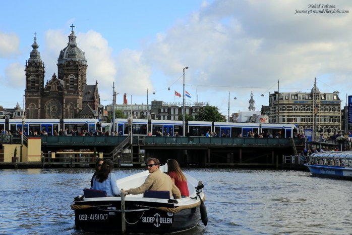 Boat tour in the canals of Amsterdam in The Netherlands