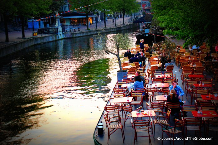 Restaurant by a canal in the old town of Leiden, the Netherlands