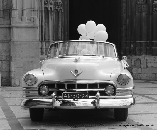 A white Cadillac waiting for the newly weds outside Basilica of St. Servetius, Maastricht
