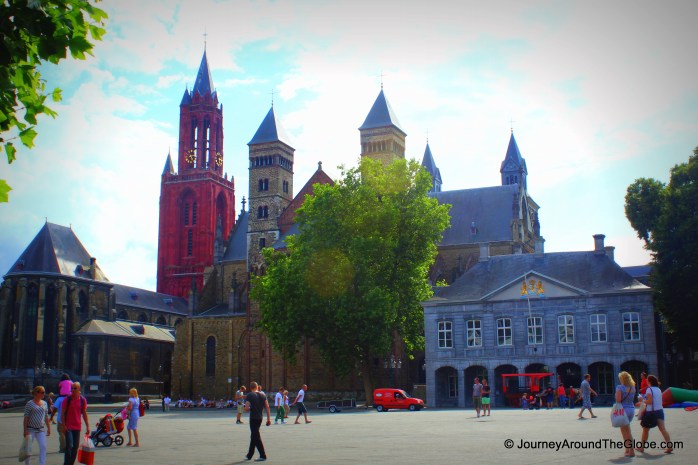 St. Jan's Church on the left with red tower and Basilica of St. Severatius on the right, Maastricht, The Netherlands