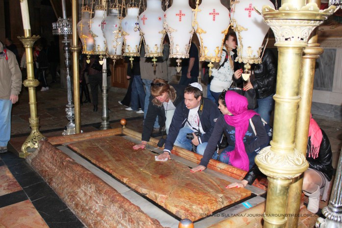 13th Station of Via Dolorosa - Stone of the Anointment, where Jesus was put after he was taken down from the cross, Holy Sepulcher, Old Jerusalem