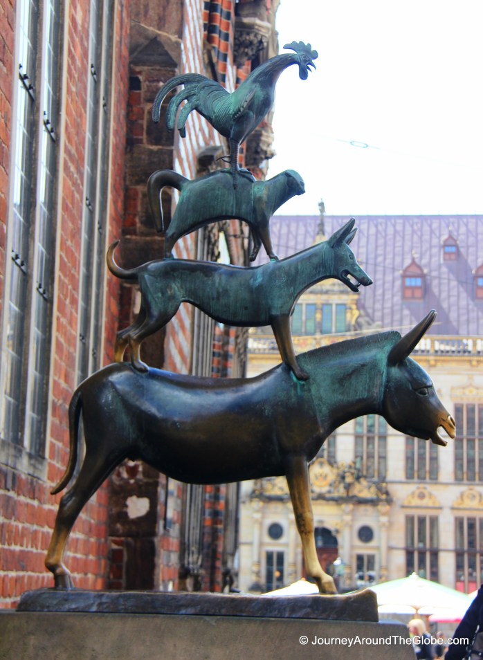 Bremen's emblem and the most photographed figure - The Musicians of Bremen (Germany)