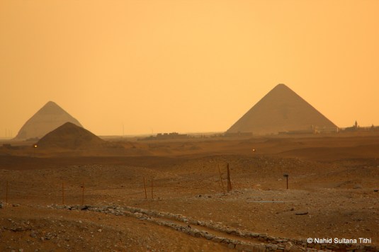 Bent pyramid (back on the left) of Dahshur and Red pyramid (on the right) in far distance, seen from Saqqara