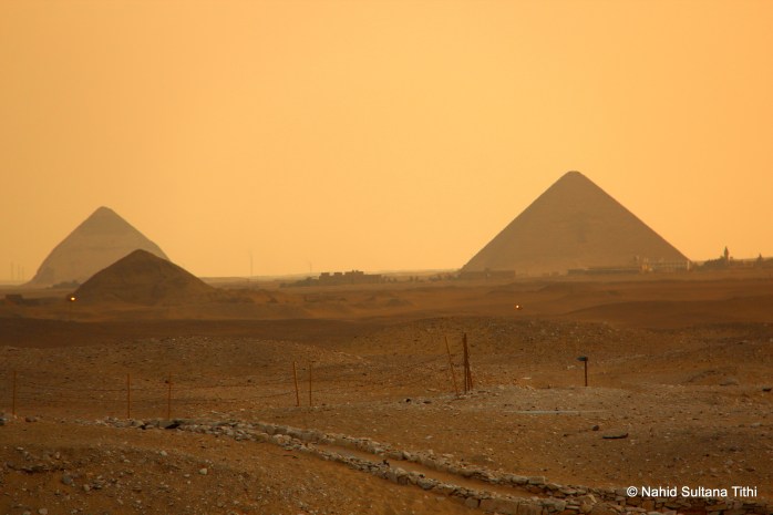 Bent pyramid (back on the left) of Dahshur and Red pyramid (on the right) in far distance, seen from Saqqara
