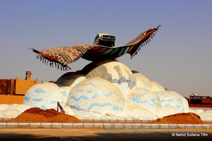 Car on a magic carpet...just a beautiful round-about in Jeddah