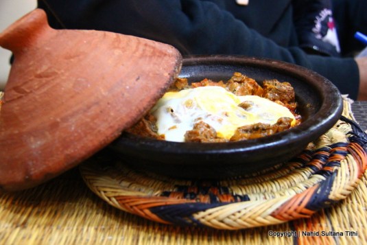 Our first dinner, traditional Moroccan Beef tagine with egg in a restaurant, Taj'in Darna, in Djemma El-Fna