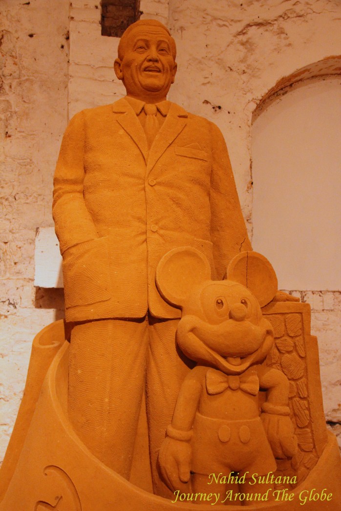 Sand Sculpture of Mr. Walt Disney and Mickey Mouse in Disney's Sand Magic in  Dinant Citadel, Belgium