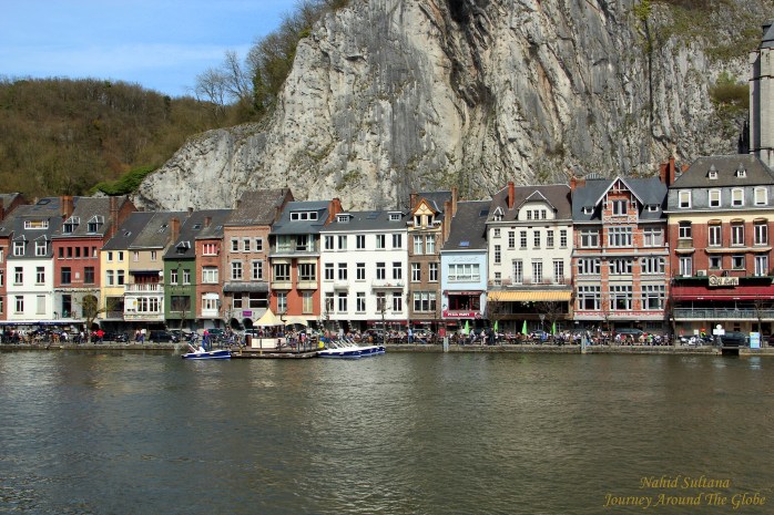 Old buildings by River Meuse in Dinant, Belgium