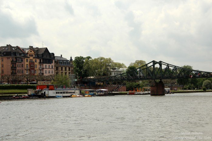 River Main and pedestrian Iron Bridge in Frankfurt, Germany