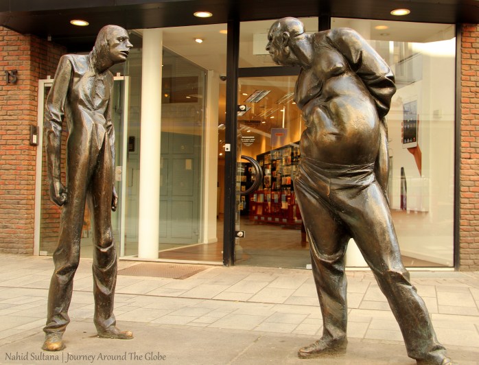 A statue, known as "Conflict", in the old town of Dusseldorf, Germany