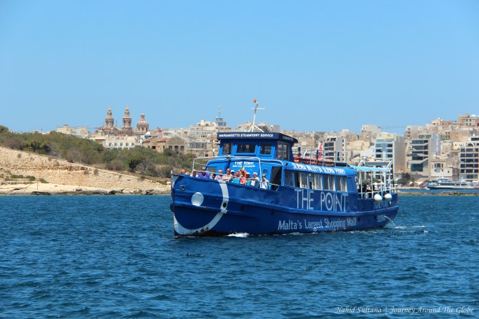The blue ferry that connects Sliema and Valletta in Malta