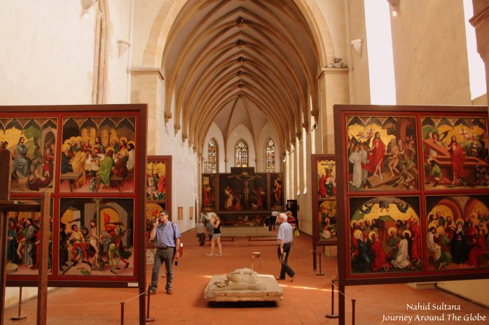 Lots of religious paintings inside Unterlinden Museum of Colmar, France