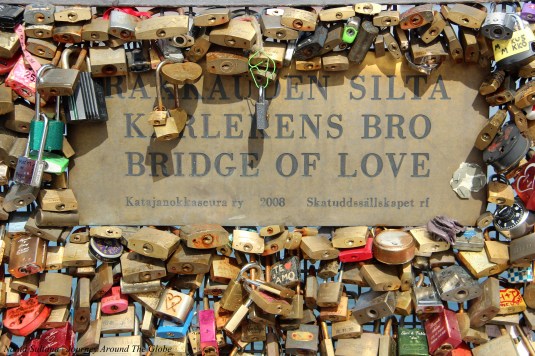 Lovelocks on Bridge of Love while walking towards Uspenski Cathedral in Helsinki
