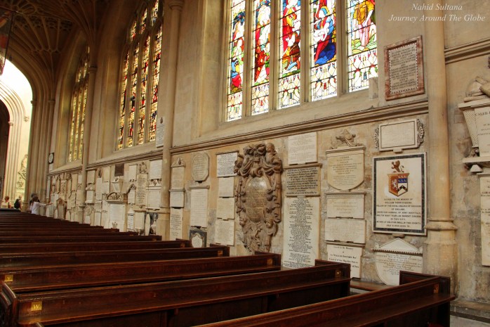 Saxon and Norman memorabilia stone-works inside Bath Abbey in Bath, England
