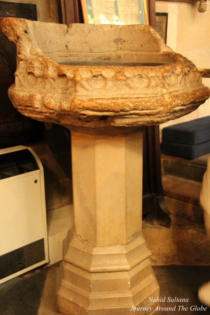 The stone bowl which was used to baptize William Shakespeare in Holy Trinity Church in Stratford-Upon-Avon, England