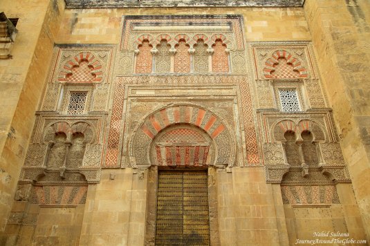 An old gate and exterior wall of Mezquita in Cordoba, Spain