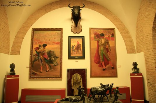 Seville Bullring Museum, the front statue shows how mules pulls away bull after it is killed in a bullfight 
