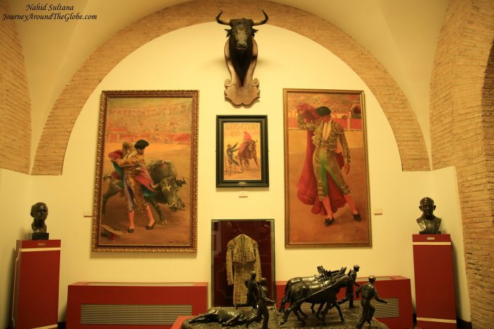 Seville Bullring Museum, the front statue shows how mules pulls away bull after it is killed in a bullfight 