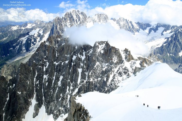 Looking at the hikers and climbers on Mont Blanc massif from our tramway 