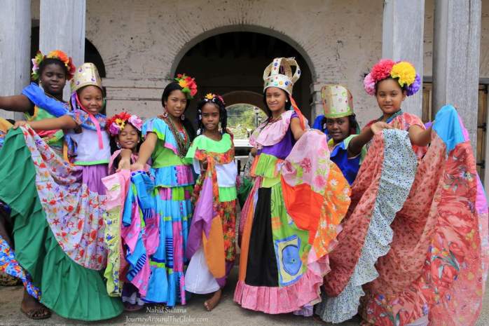 Girls in Portobelo, Panama in their colorful ethnic outfits