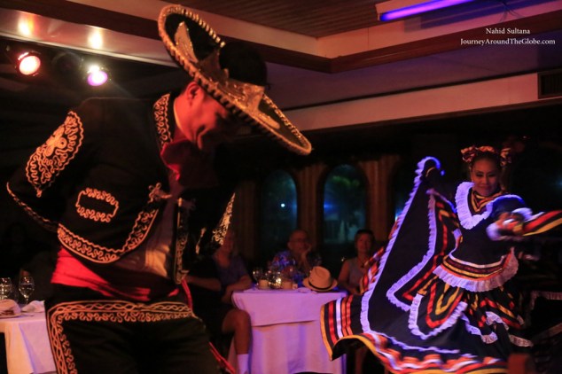 Traditional Mexican folk dance in Sunset cruise in Cabo, Mexico