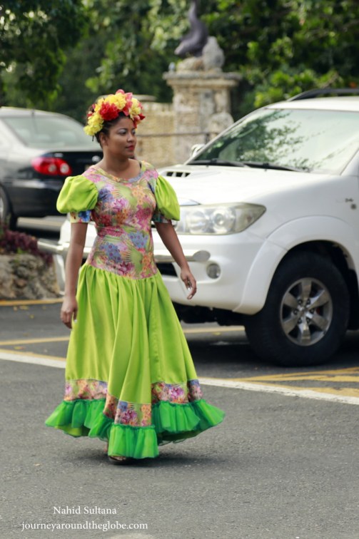 A local wearing traditional Dominican dress in Punta Cana